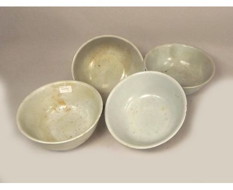 TEK SING CARGO.
Four Chinese Tek Sing cargo porcelain bowls, with light turquoise glaze inside & out.
Diameter 16.5cm.