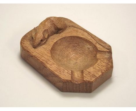 MOUSEMAN ASHTRAY.
A Thompson of Kilburn, carved oak ashtray by Robert 'Mouseman'.
Width 10cm.