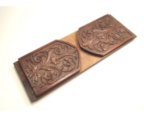 BOOK TROUGH.
A carved oak book trough, 45cm.