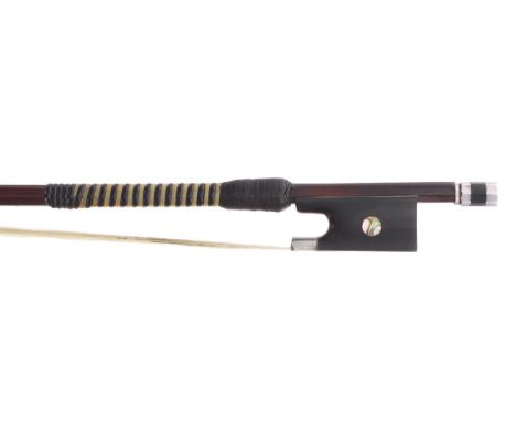 French violin bow of the Peccatte School circa 1860, the stick round, the ebony frog inlaid with pearl eyes and the ebony adj