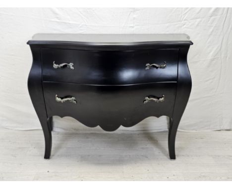 A contemporary ebonised bombe form commode chest. H.88 W.120 D.55cm. 