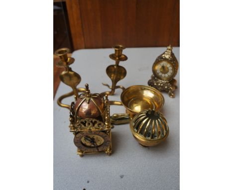 Smiths lantern clock together with other brass ware