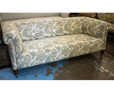 CHESTERFIELD SOFA, 71cm H x 207cm W, Victorian, in Sanderson blue and white foliate fabric, on front castors. 