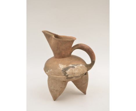 A Red Pottery Tripod Ewer, Neolithic period, Dawenkou culture, c. 4300-2400 BCReference.For a similar red pottery tripod ewer