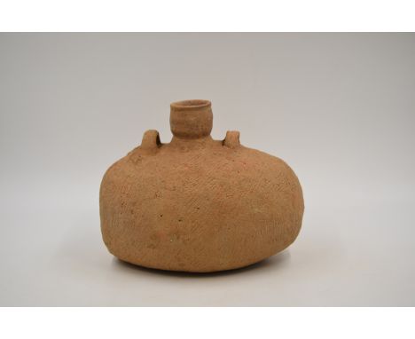 A Rare Red Pottery Flask, Yangshao culture, c. 4800-3500 B.C.Reference.For a similar red pottery boat-form flask, Yangshao cu