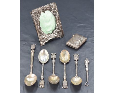 A group of five French .800 grade white metal souvenir spoons, each surmounted with armorial crest, four with makers mark for