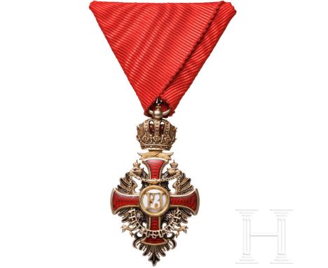Franz-Joseph-Orden - Ritterkreuz mit Widmung  Vergoldete Ausführung, beidseitig emailliert. Der Revers-Medaillonring mit schw