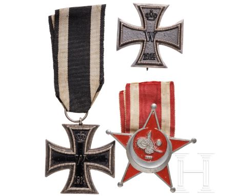 Eisernes Kreuz 1. und 2. Klasse von 1914  Jeweils mit geschwärztem Eisenkern in Silberzarge. Die 1. Klasse mit rs. Vertikalna