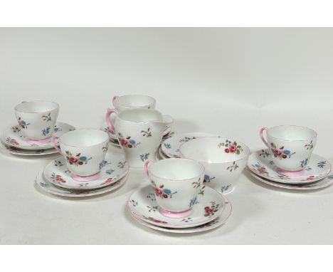 A 1930s Shelley china twenty piece tea service comprising six cups, (h 7cm x 8cm), six side plates and six saucers, a milk ju