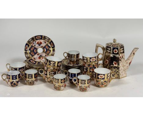 A Davenport Imari pattern part tea service comprising, five plates, three saucers, a tea pot, six espresso saucers, six espre