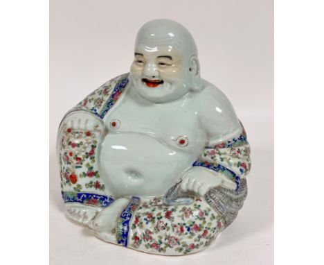 A late 19thc early 20thc Chinese Happy Buddha seated figure with one leg crossed with pierced ear holes decorated in Canton s