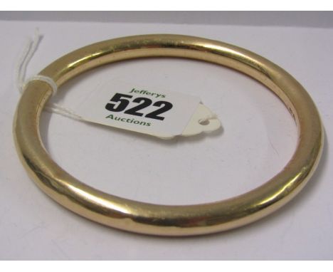 9CT YELLOW GOLD VINTAGE HOLLOW SLAVE BANGLE, approximately 16 grams in weight 