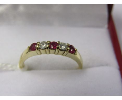 9ct YELLOW GOLD 5 STONE RUBY &amp; DIAMOND RING, 3 Well matched rubies of good colour separated by a pair of brilliant cut di