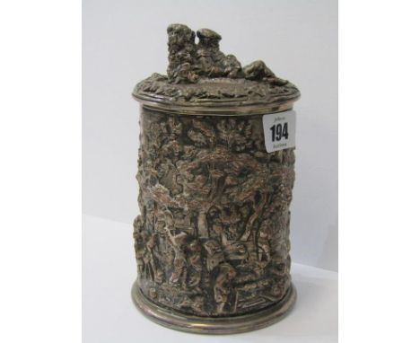 IMPRESSIVE SILVERPLATE STORAGE JAR,  the finial of a sleeping peasant the body heavily decorated with figures in woodland set