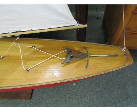 VINTAGE POND YACHT, A lovely pond yacht with lead keel, painted hull, beech deck boards, measures approx 60" length, 92" high