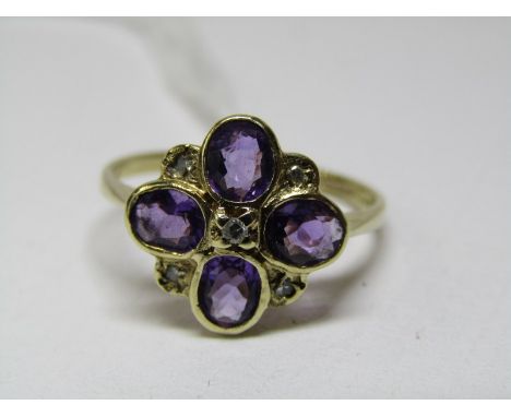 9ct YELLOW GOLD AMETHYST &amp; DIAMOND CLUSTER RING, 4 principal oval cut amethysts, each seperated by a small accent brillia