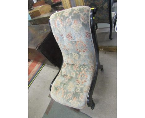 NURSING CHAIR, 19th Century ebonised framed nursing chair with green floral upholstered seat on fluted front supports &amp; c