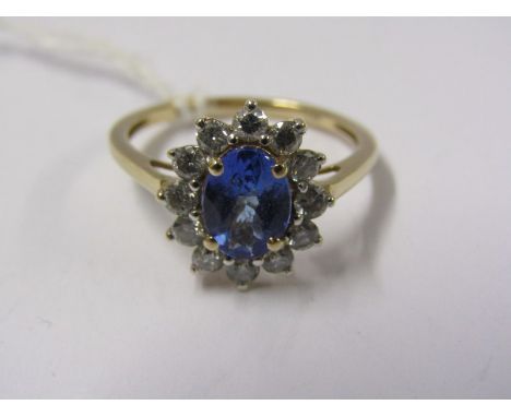14ct YELLOW GOLD TANZANITE &amp; DIAMOND CLUSTER RING, Principal oval cut tanzanite of approx 1.25ct surrounded by a halo of 