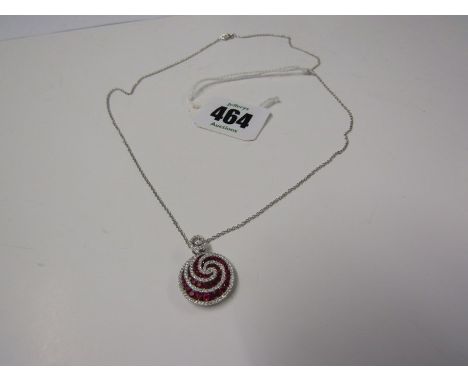 UNUSUAL 18CT WHITE GOLD RUBY &amp; DIAMOND SWIRL PENDANT, on 18ct white gold fine belcher link chain, hypnotic design 