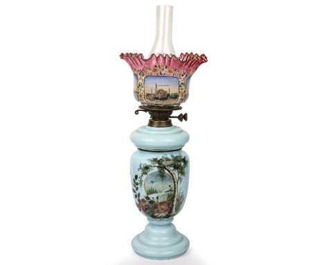 A 19th century blue glass oil lamp the cranberry glass shade with painted decoration. 53cm highGood, minor surface marks.