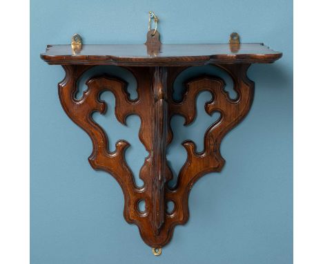 A Victorian rosewood clock or wall bracket, with pierced supports and serpentine top40cm wide x 23cm deep x 40cm highQty: 1Mi