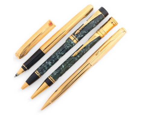 A Parker Duofold Centennial ballpoint pen with gilt detail and green marbled body, together with another similar ballpen and 