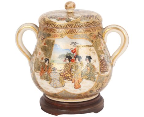 A Japanese Satsuma porcelain 2-handled pot and cover, painted and gilded garden scenes, signed under base, height 10cm&nbsp;G