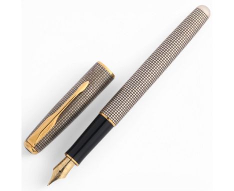 A Parker Cisele fountain pen, with unmarked white metal crosshatch body, 18k nib and converterFrom a private collection of Ex