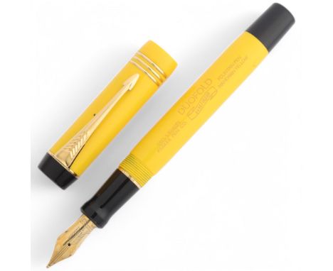 A Parker Duofold Mandarin limited edition fountain pen, No. 06645 of 10,000, produced 1995 as a reissue of the 1927 original,
