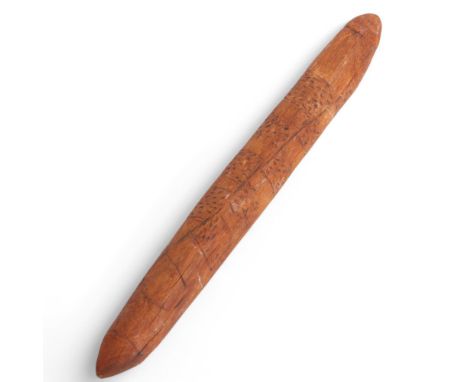 An Australian Aboriginal message stick, with engraved decoration, length 27cm