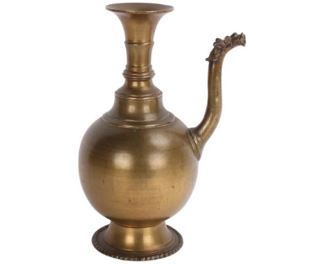 A Nepalese bronze surahi ewer, 18th or 19th century, height 23cm