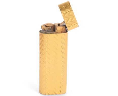A Cartier gold plated cigarette lighter, serial no. A31823, 7cm long, with red suede pouchUntested working order, dents to to
