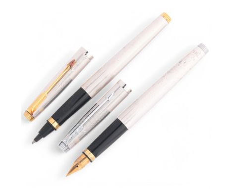 A Parker 585 fountain pen with M 14ct gold nib and converter, together with a 585 rollerball pen, both marked Parker, Made In