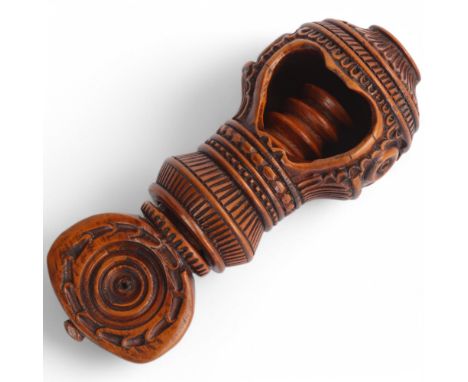 A 19th century carved treen nutcracker, length 11cmGood condition, general wear through handling and use