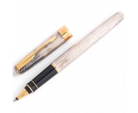A Parker Senator/Sonnet Mistral rollerball pen in white metal body and gilt detail, marked to cap Parker, Senator, France, A0