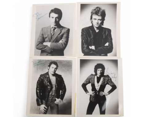 Queen, a rare set of 4 autographed promotional photographs circa 1980, illustrating each member of the band, in green ink by 