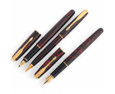 A Parker Senator/Sonnet fountain pen with 18k nib, together with rollerball pen and mechanical pencil, all with gilt detailin
