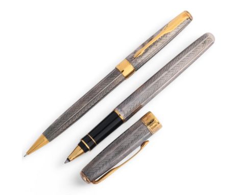 A Parker Senator/Sonnet Mistral rollerball and mechanical pencil, with unmarked white metal body and gilt detail, both marked