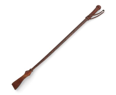 A woven leather-bound riding crop, circa 1900, with concealed dagger in the handle, length 59cm