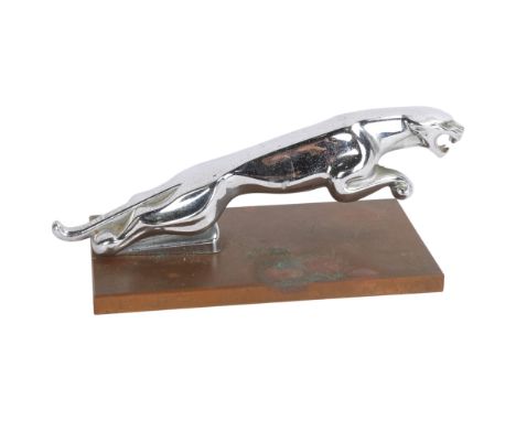 A chrome plate Jaguar car mascot on copper base, length 19cmGood condition