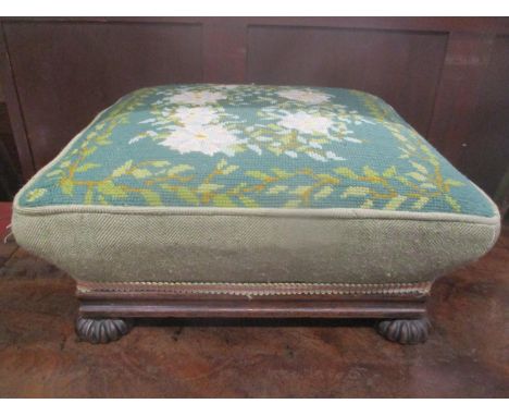 A 19th century tapestry topped footstool, 16cm h x 38.5cm w 