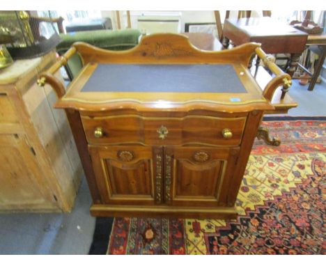 A Continental wood side unit/washstand with shaped extended back with incised fir cone decoration, the top with inset stone e