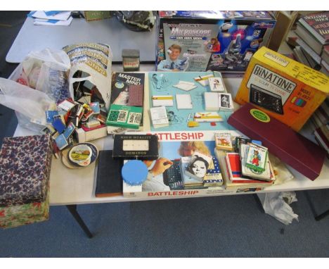 A quantity of vintage games to include a boxed Binatone colour TV game model 01/4931, various playing cards and a collection 