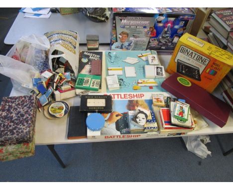 A quantity of vintage games to include a boxed Binatone colour TV game model 01/4931, various playing cards and a collection 