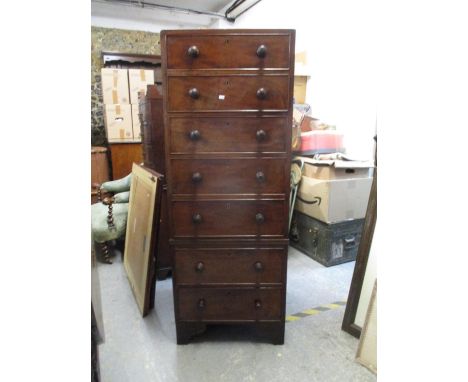 An adapted Victorian mahogany chest of seven drawers with a stained pine top, on bracket feet 143cm h x 53cm w x 56cm d 
