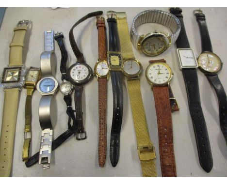 A group of wristwatches to include Rotary, Seiko, Swarovski and a yellow metal part cased ladies cocktail watch A/F 