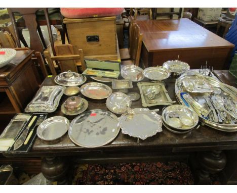 A quantity of silver plate to include a large oval galleried tray, cased ivory and white metal salad servers, entrée dishes, 