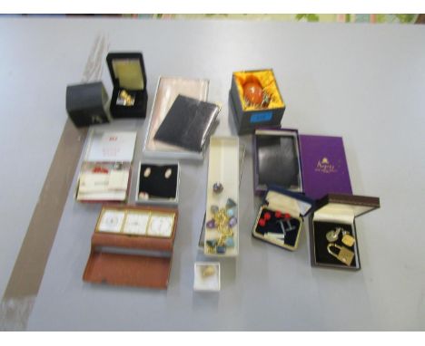 A selection of jewellery and other items to include silver cufflinks, and an Angelus three some, dressing table clock, barome