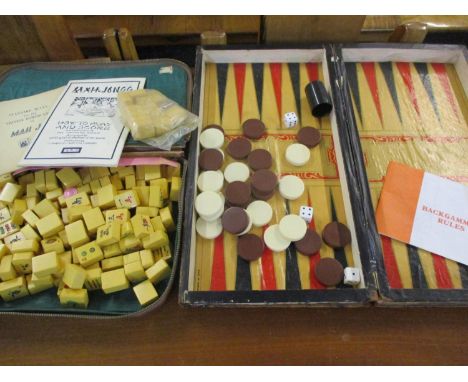 A mid 20th century MahJong set in a faux leather case together with a vintage Backgammon 