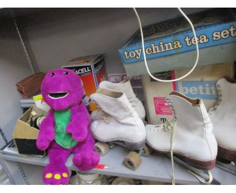Retro items to include rollerblades, roller skates, Osmond's Collectors items, a Playcraft typewriter, an in-car DVD system, 